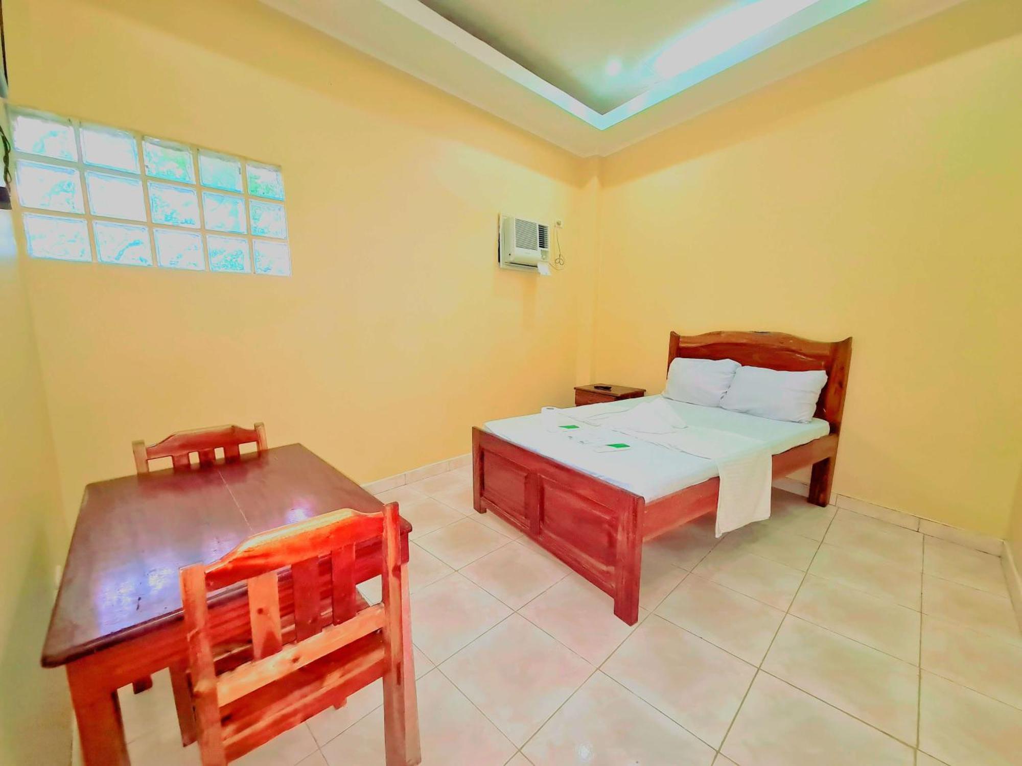 سيكويجور La-Familia Guest House الغرفة الصورة